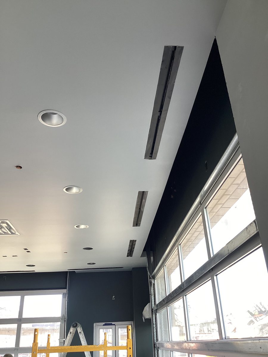 Commercial ceiling linear diffuser installation by R&R Environmental Mechanical