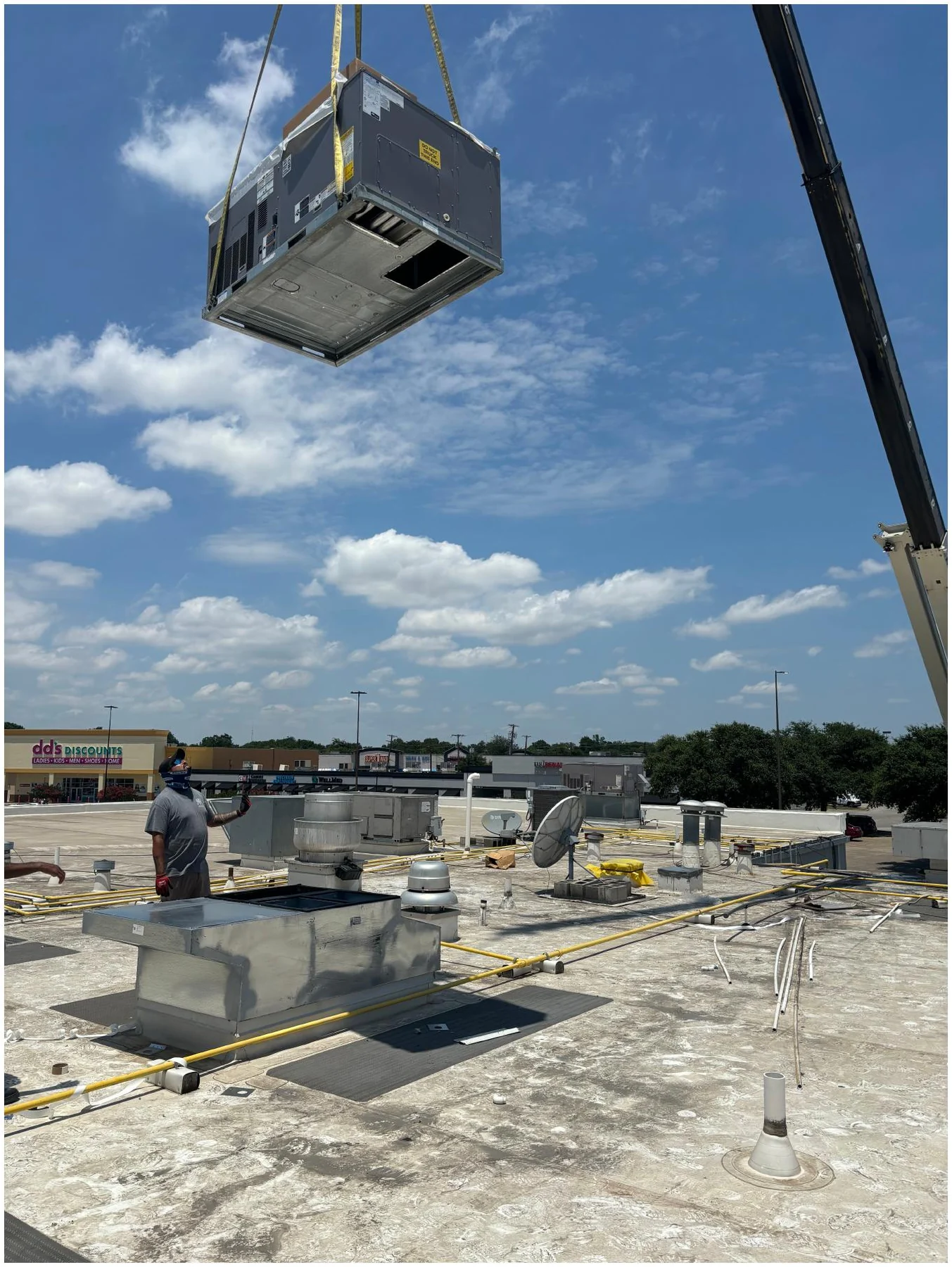 Crane-set HVAC equipment by R&R Environmental Mechanical